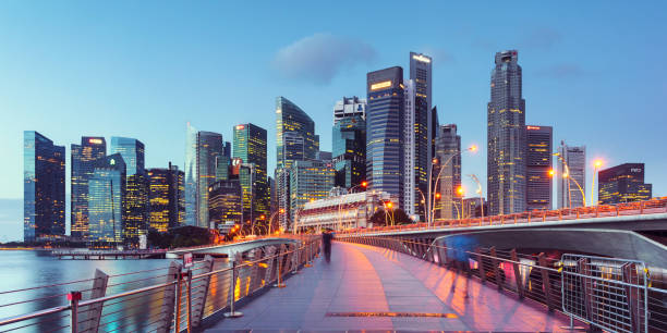 Downtown Singapore View of Jubilee Bridge going towards downtown Singapore. singapore city stock pictures, royalty-free photos & images