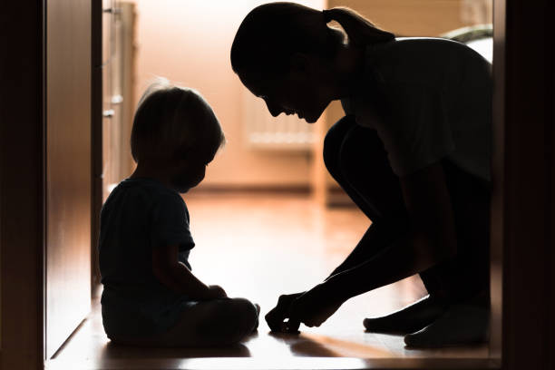istock Mother talking with her little child at home 1138710041