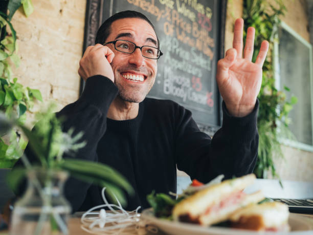istock Caucasian man having lunch at the small bistro 1138710338