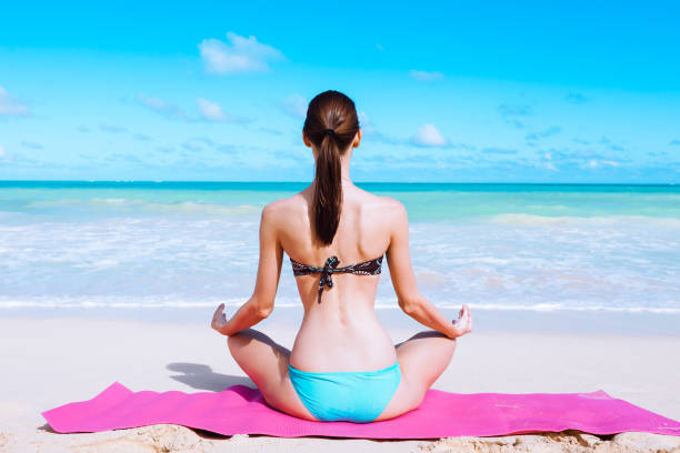 istock Woman at the beach 1138710980