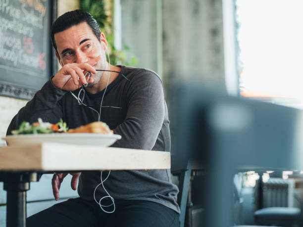 istock Caucasian man having a break at the small bistro 1138711343