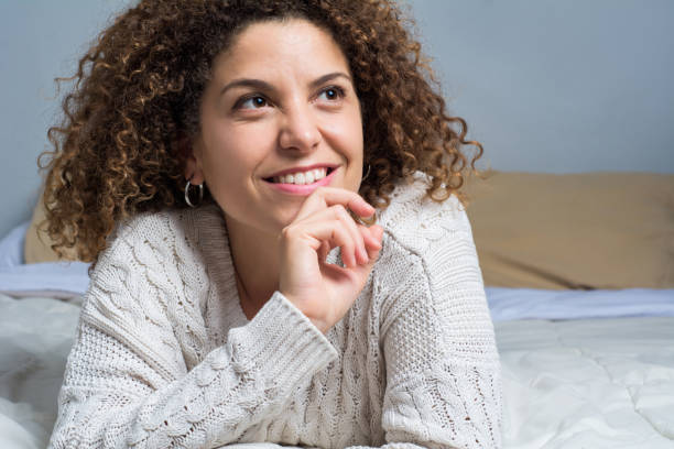 istock Young woman lying on the bed 1138711594