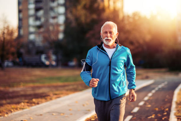 istock Senior man jogging in city 1138715462