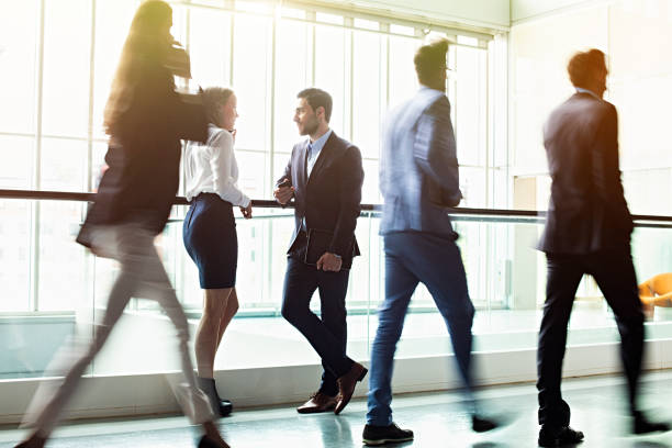 istock Business people in lobby walking 1138716015