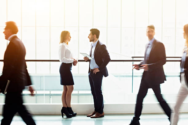 istock Business people in lobby walking 1138716054