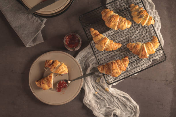 istock Baked croissants with strawberry jam 1138717092