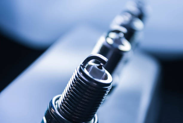 Spark plugs for car, on light background Spark plugs for car, on light background. Close-up ignition photos stock pictures, royalty-free photos & images