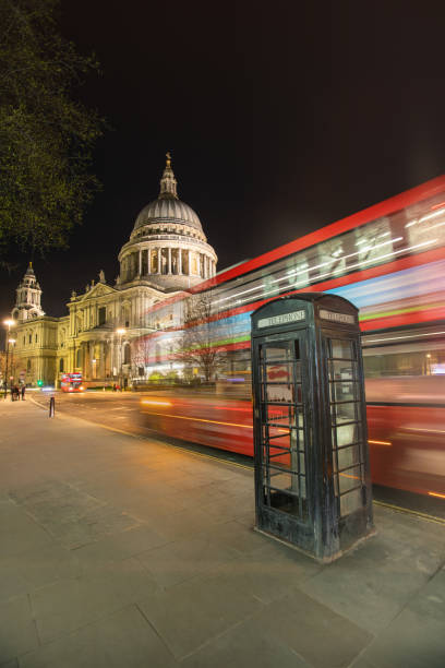 St Paul's Cathedral at night bus light trail