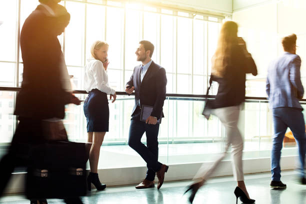 istock Business people in lobby walking 1138718449