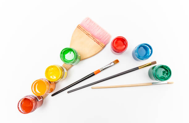 istock Multicolored painting paints and brushes on white background 1138720687
