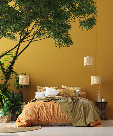 Dormitorio interior de estilo bohemio con cama estampada y rincón floral photo