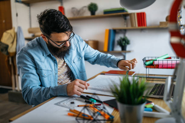 istock Young architect working from early morning 1138722188
