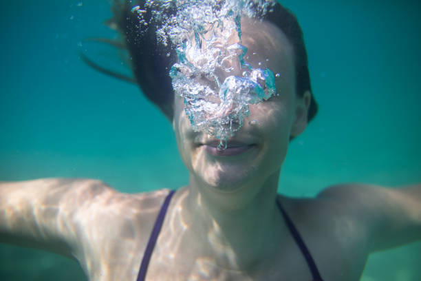 istock Girl dive, underwater fun 1138722324
