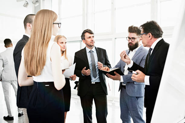 istock Businessman presenting new project to partners 1138722340