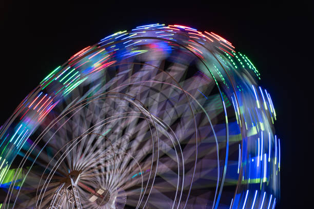 istock Spinning ferris wheel in motion 1138724181