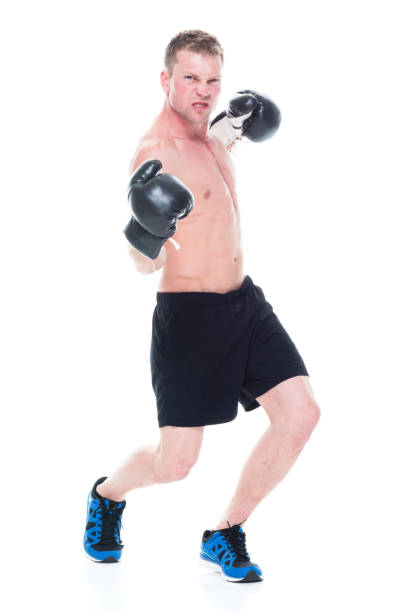 istock Shirtless handsome man boxing 1138730214