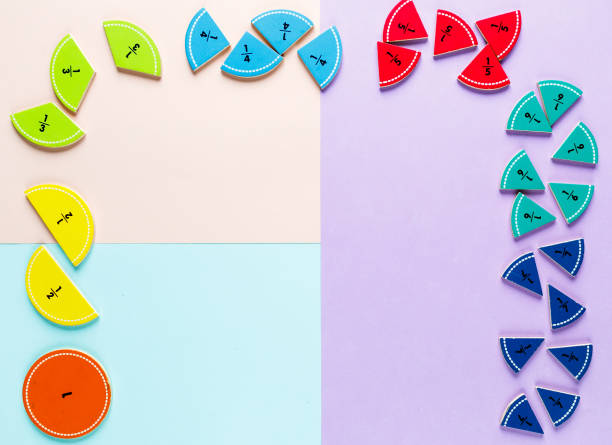 istock Colorful math fractions on the pink blue violet  bright backgrounds. Interesting math for kids. Education, back to school concept. Geometry and mathematics materials. 1138732313