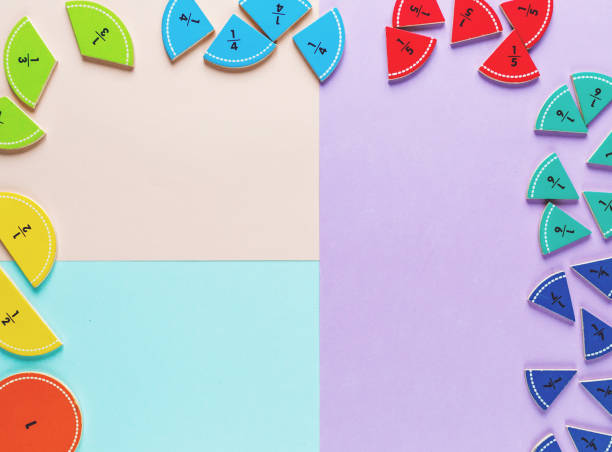 istock Colorful math fractions on the pink blue violet  bright backgrounds. Interesting math for kids. Education, back to school concept. Geometry and mathematics materials. 1138732316