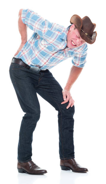 istock Handsome cowboy is having back pain 1138734222