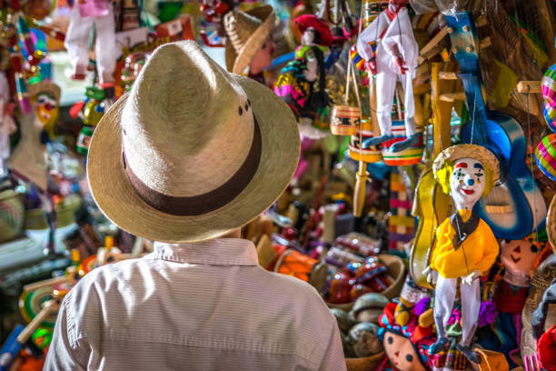 istock A Kid trying to choose a hand made toy 1138738157