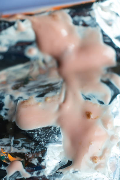 Sweet Pink Chocolate Bar dissolved on foil package, Close up & Macro shot, Selective focus, About Candy  snack concept