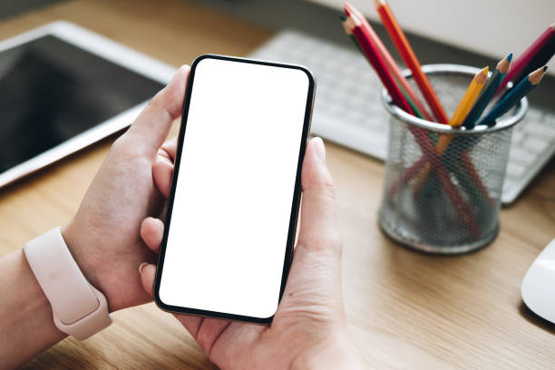 istock woman using Smartphone. Blank screen mobile phone for graphic display montage.networking service. 1138742119