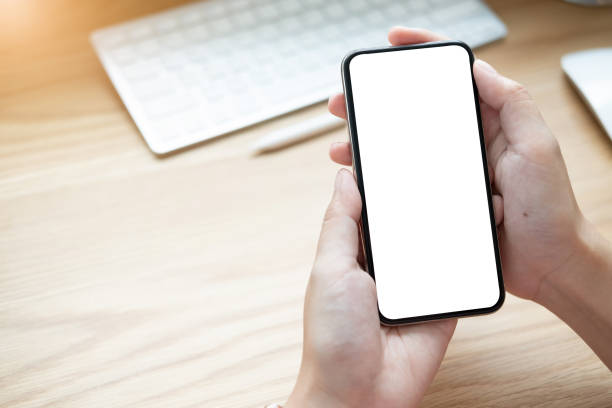 istock woman using Smartphone. Blank screen mobile phone for graphic display montage.networking service. 1138742145