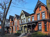 istock Row of old Victorian style brick houses with gables 1138742797