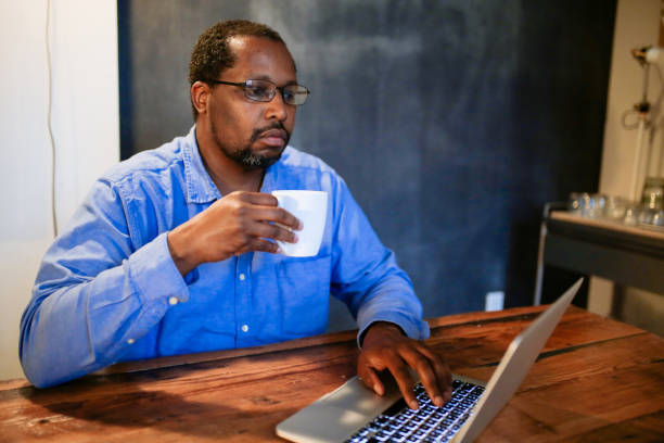 istock man working late in the casual co-working space 1138742853