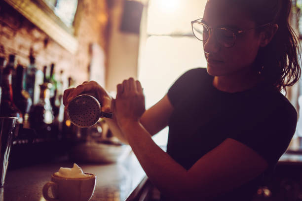 istock Young woman making coffee 1138748133