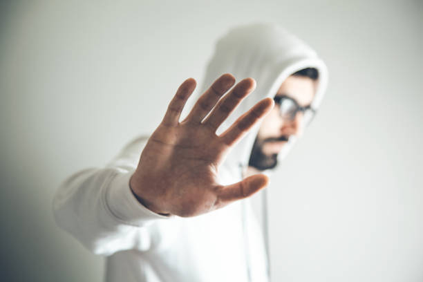 mano hombre dejar de firmar en la cara - 6721 fotografías e imágenes de stock