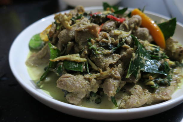 fried green curry paste with slice pork