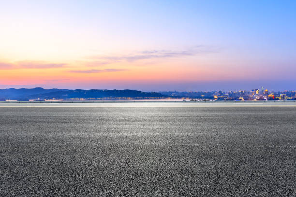 istock Empty asphalt road passing through the city above in Hangzhou 1138764130