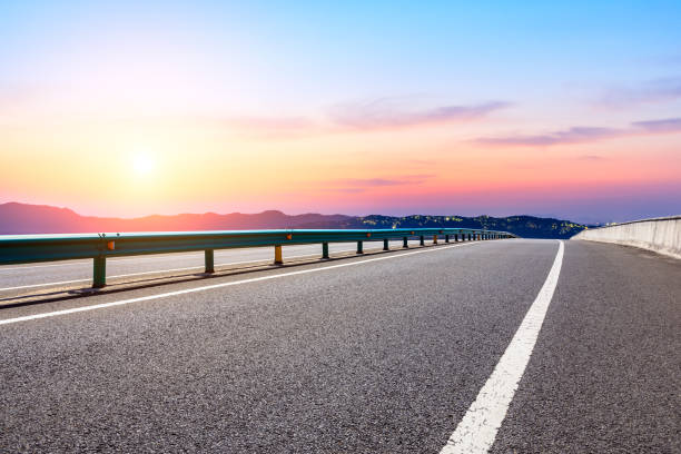 istock Empty asphalt road and beautiful mountain nature landscape 1138765210