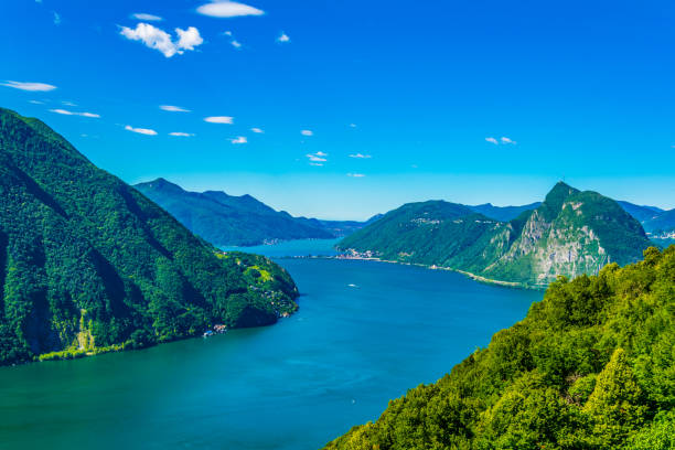 istock Lugano lake in Switzerland 1138770385