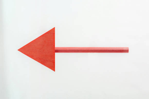 istock RED wooden arrow to the left. 1138770949