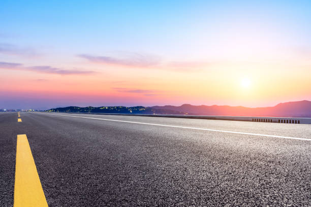 istock Empty asphalt road and beautiful mountain nature landscape 1138771086