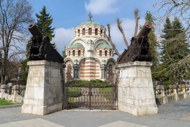 Photo of St. George the Conqueror Chapel Mausoleum in the city of Pleven, Bulgaria. Orthodox church in the city, memorial - The Eternal Fire