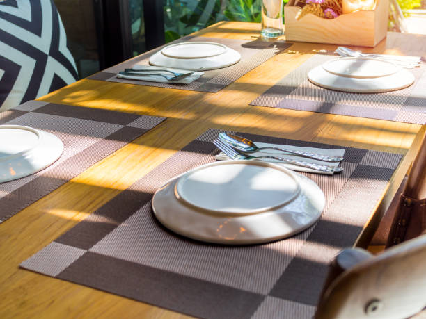 istock Dining table set in restaurant with romantic sunshine 1138780869