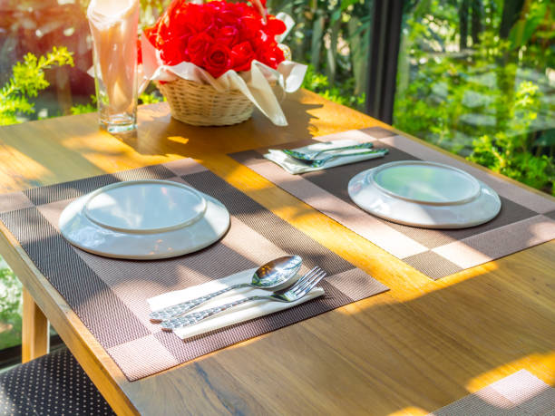 istock Dining table set in restaurant with romantic sunshine 1138780873
