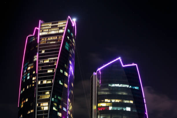 Etihad Towers at night stock photo