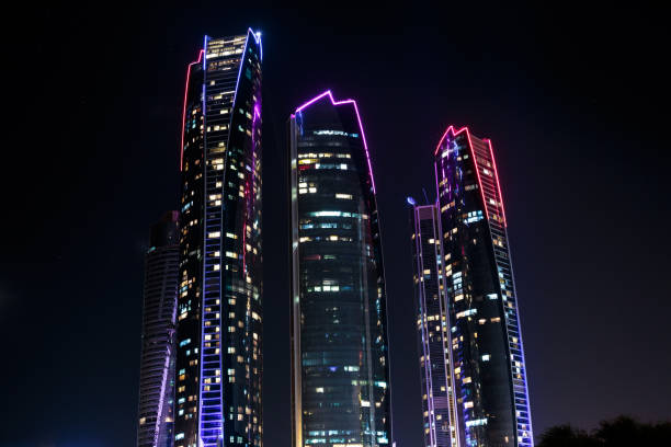 Etihad Towers at night stock photo