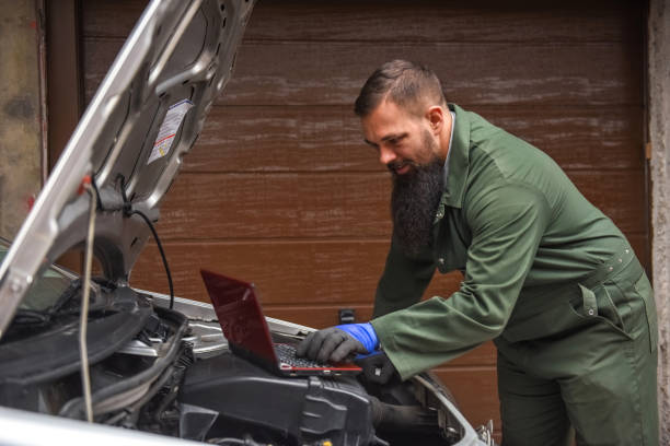 istock Professional car mechanic working in auto repair service 1138784112