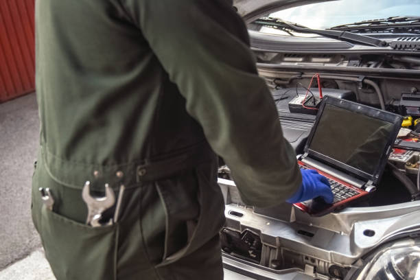 istock Professional car mechanic working in auto repair service 1138784986