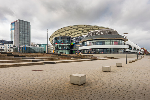 Ludwigshafen, Germany - March 17, 2019: Huge shopping mall, called Rhein-Galerie, in Ludwigshafen. Ist is located beside River Rhine and in front is a huge square.