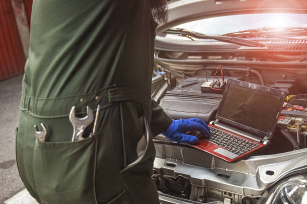 istock Professional car mechanic working in auto repair service 1138786218