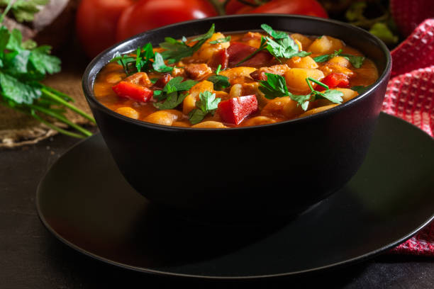 istock White bean soup with potatoes, tomatoes, paprika, and bacon 1138787676