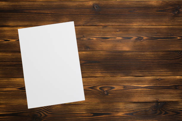 istock Blank paper on  wooden background - Image 1138787804