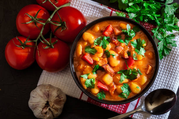 istock White bean soup with potatoes, tomatoes, paprika, and bacon 1138789621