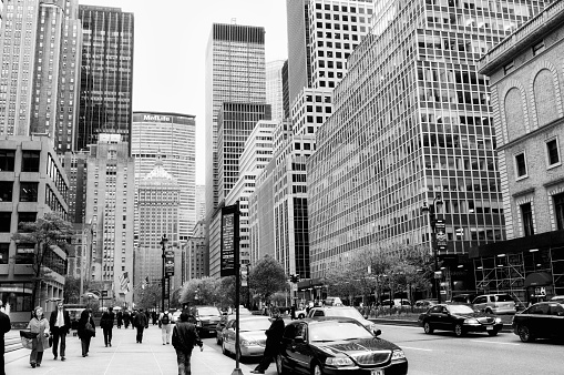 Manhattan, NYC, USA - April/13/2010: people walking in Park Avenue, Midtown Manhattan.